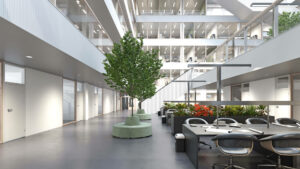Modernes Bürogebäude mit offenen Arbeitsplätzen und Begrünung – symbolisiert flexible Nutzung gewerblicher Mietflächen